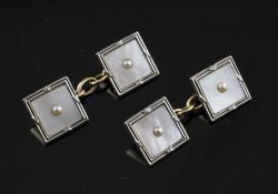 A pair of 1920`s 9ct gold and platinum, mother of pearl and split pearl set cufflinks, of square