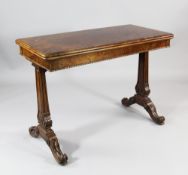 A Victorian burr walnut folding card table, on anthemion carved trestle end supports and scroll