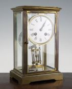 An early 20th century French brass four glass mantel clock, with enamelled Roman dial, Marti & Co