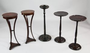 A pair of French mahogany circular gueridons, on splay tripod legs and platform bases, H.2ft,