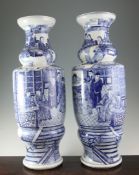 A pair of large Chinese blue and white vases, late 19th century, each of unusual form with a