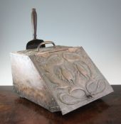 A John Pearson Newlyn copper coal scuttle, with embossed decoration depicting two birds and scrolls,