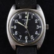 A gentleman`s stainless steel Hamilton military manual wind wrist watch, with black Arabic tritium