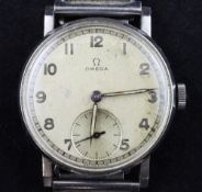 A gentleman`s late 1930`s stainless steel Omega military manual wind wrist watch, with Arabic dial