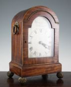 A Regency brass mounted mahogany bracket timepiece, with silvered Roman dial signed William