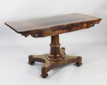 A Regency rosewood rectangular side table, with single frieze drawer and scroll carved corner