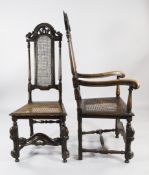 A set of six Carolean style oak dining chairs, with caned backs and seats and arched crest rails
