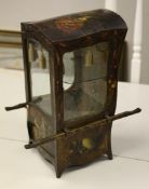 A 19th century table top display cabinet modelled as a sedan chair, painted with 18th century