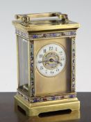 An early 20th century French gilt brass and champleve enamel carriage timepiece, with arabic dial,