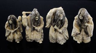 Four Japanese ivory netsuke of Kabuki actors, early 20th century, each with reversible heads and