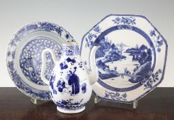 A Chinese blue and white teapot and two plates, 18th / 19th century, the pear shaped teapot