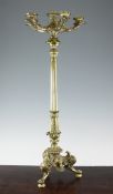 A 19th century French gilt bronze six branch candelabra, with stiff leaf decoration and tapering