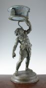 A late 19th / early 20th century Italian bronze jardiniere stand, modelled as Bacchus and snake,