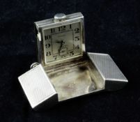 A late 1920`s engine turned 935 standard silver Tavannes for Dunhill, golfers belt buckle watch,