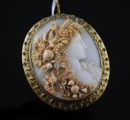 A Victorian gold mounted oval cameo brooch, of oval form, carved with the bust of a lady to sinister