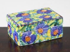 Giacomo Dolcetti of Venice. A maiolica box and cover, c.1925, painted with blue flowers and green