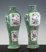 A pair of Chinese famille rose flattened baluster vases, Qianlong period, each painted to raised