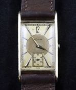A gentleman`s stylish 1930`s/1940`s 14ct gold Le Coultre manual wind wrist watch, the rectangular