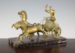 A 19th century gilt bronze model of a Roman Charioteer, on a rectangular marble base with a beaded