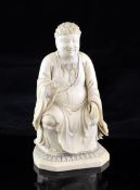 A Chinese ivory seated figure of Buddha Ru Lai, 19th century, the figure wearing flowing robes and