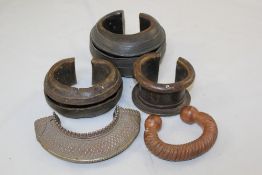 A collection of African manillas, or slave trade money, of traditional form, and other cuff bangles