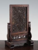 A Chinese tortoiseshell and rosewood table screen, early 20th century, the inset tortoiseshell panel