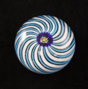 A Clichy glass blue and white swirl paperweight, c.1850, the centre decorated with a cane