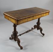 A Victorian burr walnut and marquetry inlaid folding card table, with vase turned end supports and