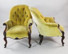 A pair of Victorian carved rosewood button back armchairs, upholstered in yellow fabric, with