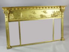 An early 19th century giltwood and gesso landscape overmantel mirror, with triple bevelled glass