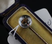 An 18ct gold and Essex crystal fox head stock pin, in fitted case, 2.5in.