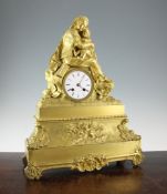 A 19th century French ormolu mantel clock, surmounted with figures of a mother and child, with