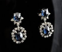 A pair of white gold, sapphire and diamond set drop earrings, of oval form, 1in.