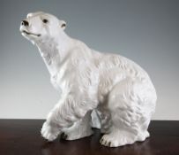 A large Royal Dux porcelain model of a seated polar bear, model no. 398/22, raised pink triangle