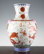 A Chinese famille rose `dragon` vase, Guangxu mark but later, of baluster form, with lion mask