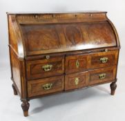 An 18th century German walnut and fruitwood inlaid cylinder bureau, revealing a fitted interior over