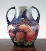 A Moorcroft Finches pattern twin handled baluster vase, c.1994, designed by Sally Tuffin, with a