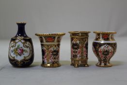 Four Royal Crown Derby miniature vases, c.1905-1932, three decorated in Imari pattern no. 1128,