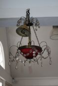 A Victorian style lustre drop electrolier, with domed cranberry shade, W.1ft 2in. Drop 1ft 7in.