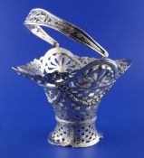 An early 20th century Hanau pierced silver sweetmeat basket, with flared oval rim and decorated with