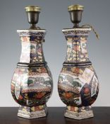 A pair of modern Imari style hexagonal baluster vases, mounted as lamps, total height 39.5cm.