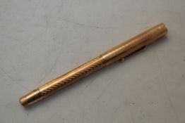 A 14ct gold Swan Mabie Todd fountain pen, with engine turned decoration, original case, 5.5in.