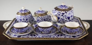 A Crown Derby blue and white cabaret set, late 19th century, decorated in the Derby Lily pattern,