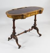 A Victorian burr walnut and boxwood inlaid writing table, the top with rounded ends, gilt tooled red