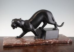 A Rochard Art Deco patinated metal model of a panther, stepping from black marble plinth onto a
