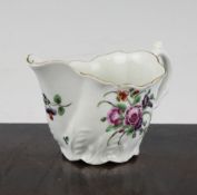 A Worcester Low Chelsea ewer, c.1775, painted with flower sprays, 4.5in.