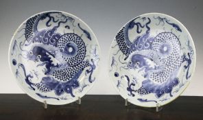 A pair of Chinese blue and white `dragon` dishes, 19th century, for the South East Asian market,