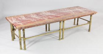 A 20th century rectangular coffee table, with rouge marble top and brass base, 5ft x 1ft 9in.