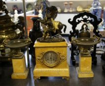 A 19th century French bronze, ormolu and Sienna marble clock garniture, with Marley horse