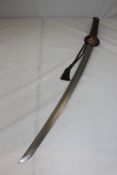 A 19th century Japanese katana, with gilt metal mounted skate skin scabbard, shark skin handle and